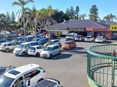 Your own desk in a tidy, sunny Orewa office image 4