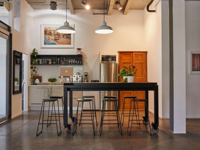 Desks in beautiful warehouse office space image 3