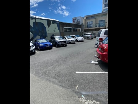 Reserved carpark in uncovered parking lot