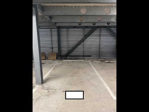 Covered car park in secure building