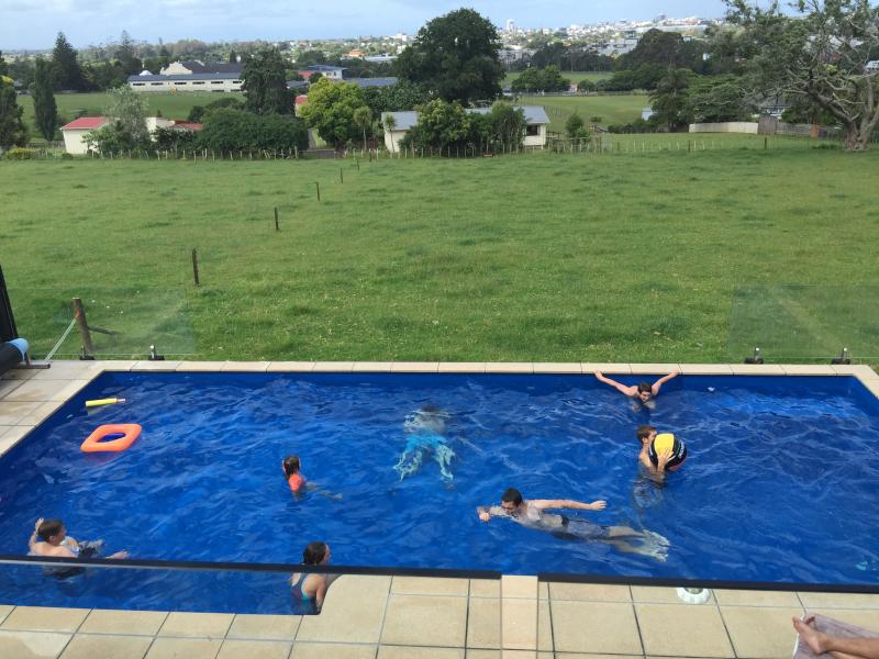 Inner city house on edge of farm with pool image 0